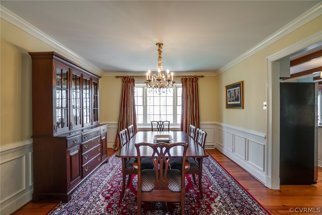 14300 West Salisbury Road Midlothian, VA 23113 - Photo 44 of 50 a view of a dining room with furniture window and wooden floor