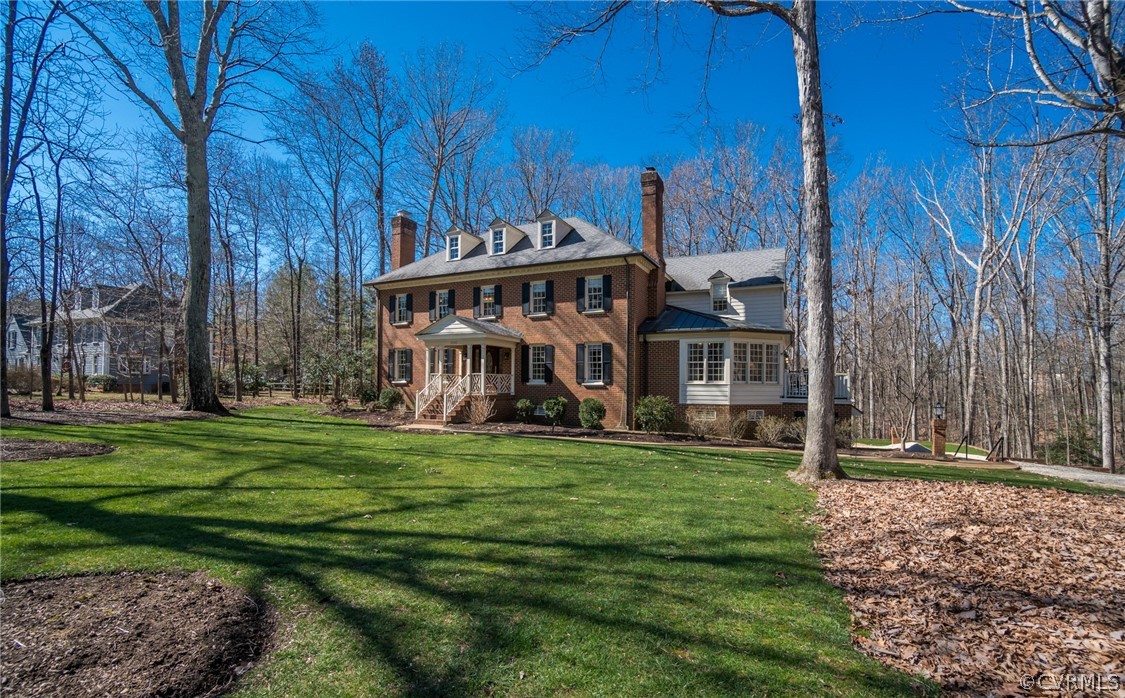 14300 West Salisbury Road Midlothian, VA 23113 - Photo 45 of 50 a view of a house with a big yard and large trees