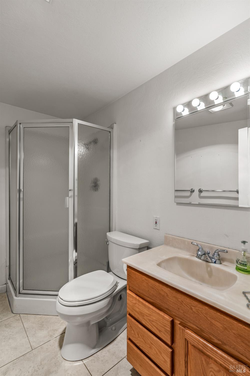 625-629 Hill Road Angwin, CA 94508 - Photo 24 of 64 a bathroom with a sink a toilet and shower