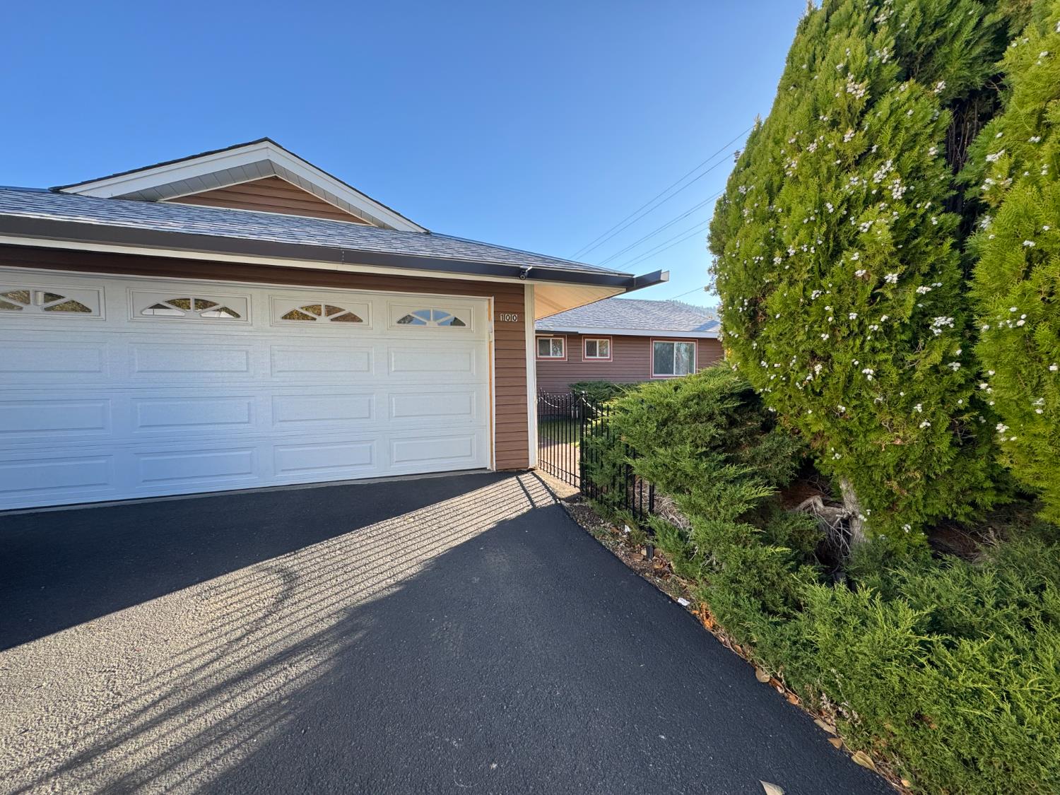 a front view of a house with a garage