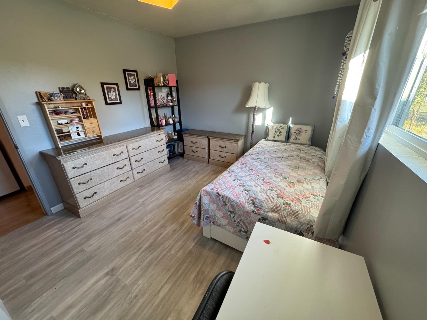 100 Patterson Avenue Loyalton, CA 96118 - Photo 14 of 36 a bed room with a bed and a tv