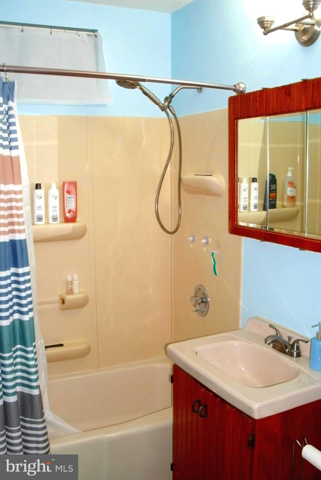 546 Compass Road East Middle River, MD 21220 - Photo 12 of 24 a bathroom with a sink and a mirror