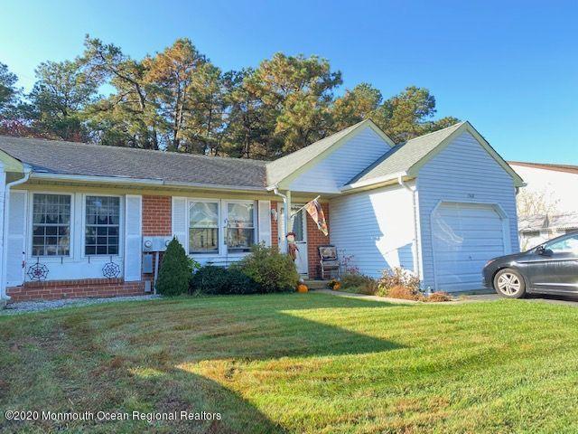 136 B Sunset Road Whiting, NJ 08759 - Photo 1 of 16 a front view of a house with garden