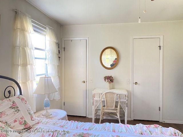 136 B Sunset Road Whiting, NJ 08759 - Photo 15 of 16 a bedroom with a bed and a window