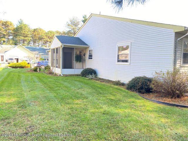 136 B Sunset Road Whiting, NJ 08759 - Photo 16 of 16 a house view with a garden space