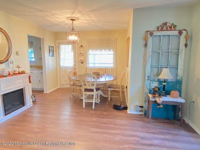 136 B Sunset Road Whiting, NJ 08759 - Photo 6 of 16 a view of a dining room with furniture window and wooden floor