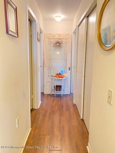 136 B Sunset Road Whiting, NJ 08759 - Photo 10 of 16 a view of a room with wooden floor and furniture