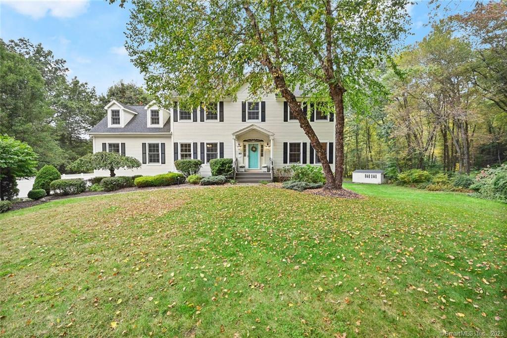 63 Turkey Roost Road Monroe, CT 06468 - Photo 1 of 1 a front view of a house with a garden