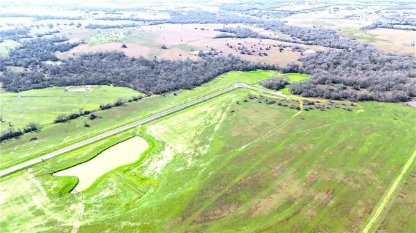 a view of a swimming pool with a lake view