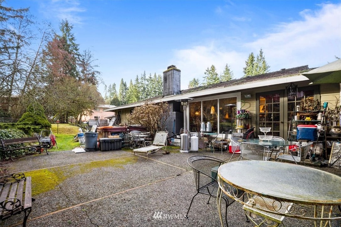 222 219th Place Southwest Bothell, WA 98021 - Photo 17 of 24 a view of a patio with table and chairs potted plants