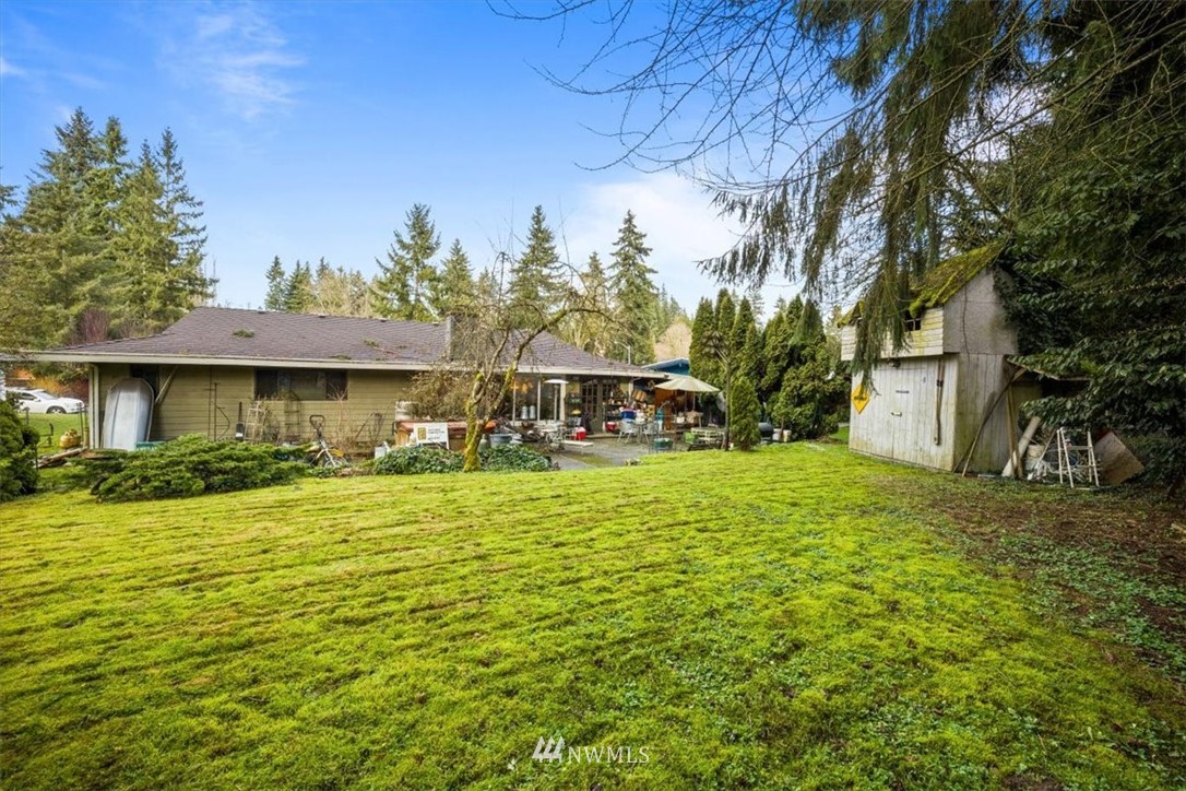 222 219th Place Southwest Bothell, WA 98021 - Photo 20 of 24 a view of a house with a yard