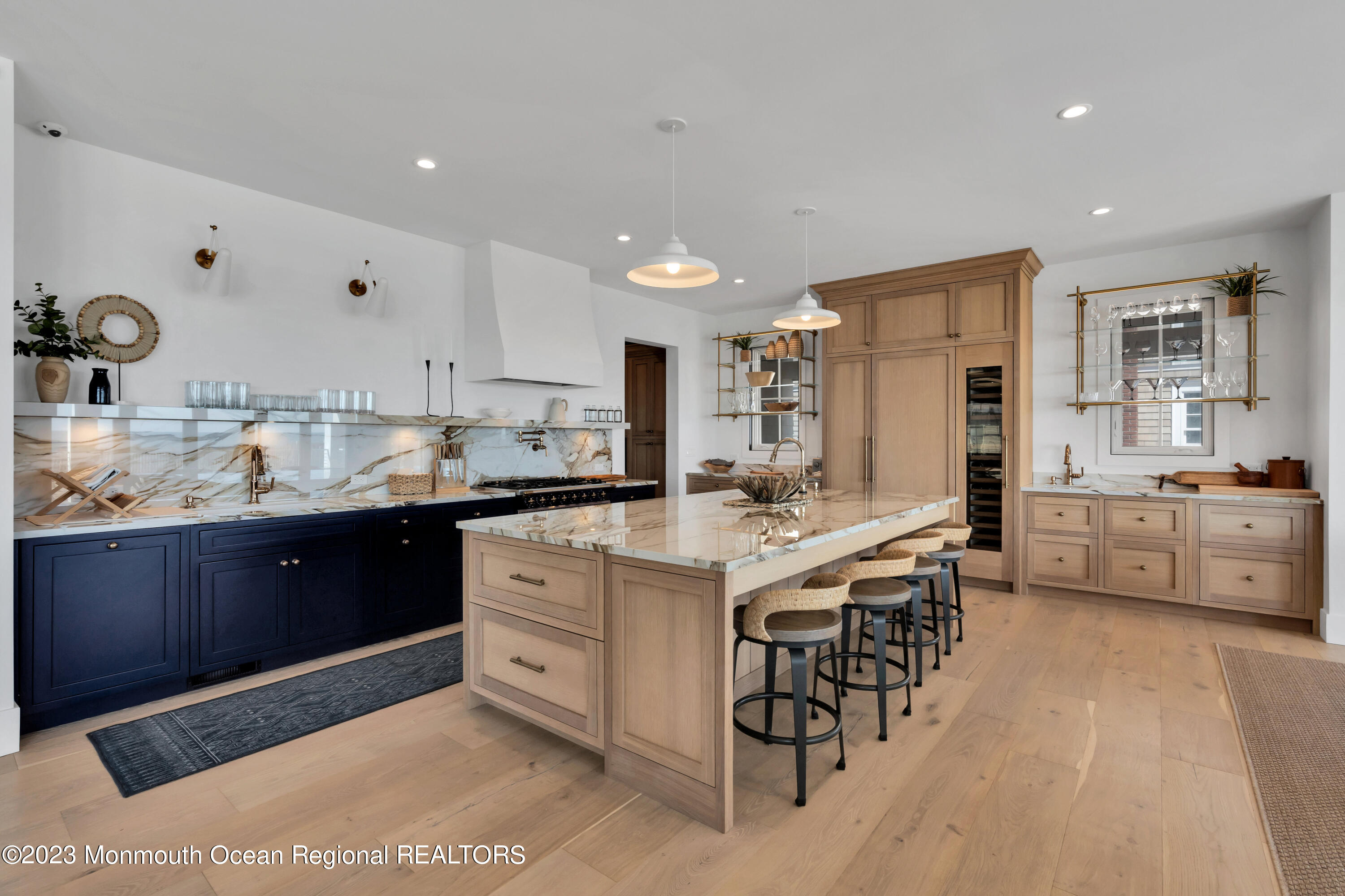 1125 North Ocean Avenue Mantoloking, NJ 08738 - Photo 16 of 69 a kitchen with stainless steel appliances kitchen island granite countertop a sink and cabinets