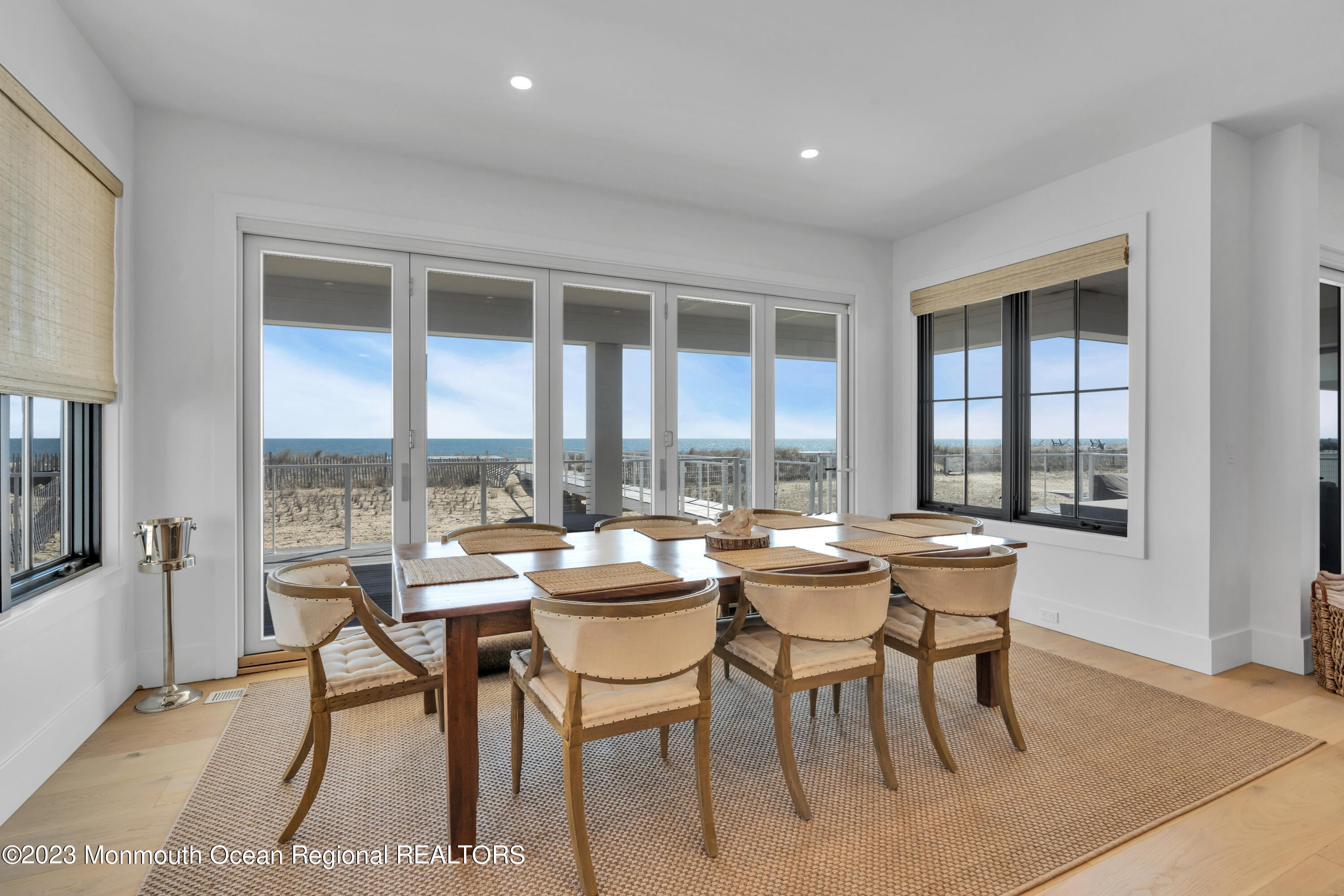 1125 North Ocean Avenue Mantoloking, NJ 08738 - Photo 22 of 69 a room with lots of table and chairs