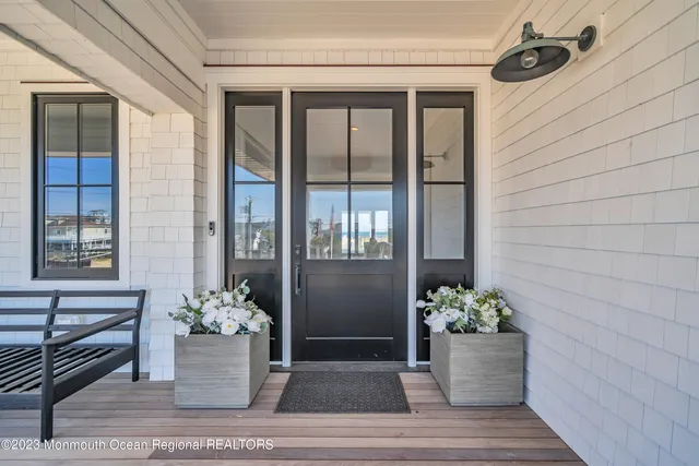 a view of a house with stairs and wooden floor