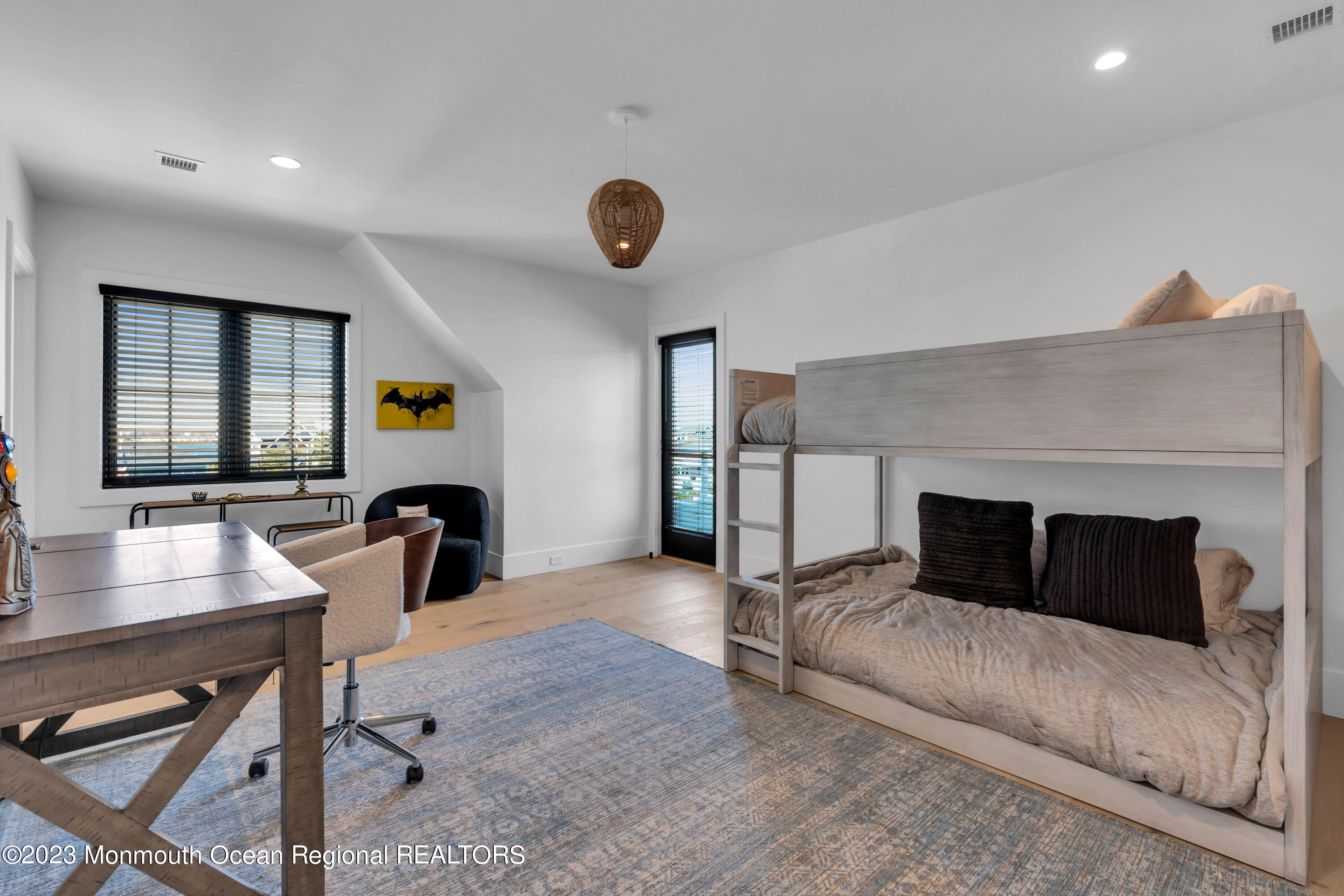 1125 North Ocean Avenue Mantoloking, NJ 08738 - Photo 44 of 69 a living room with furniture and a fireplace