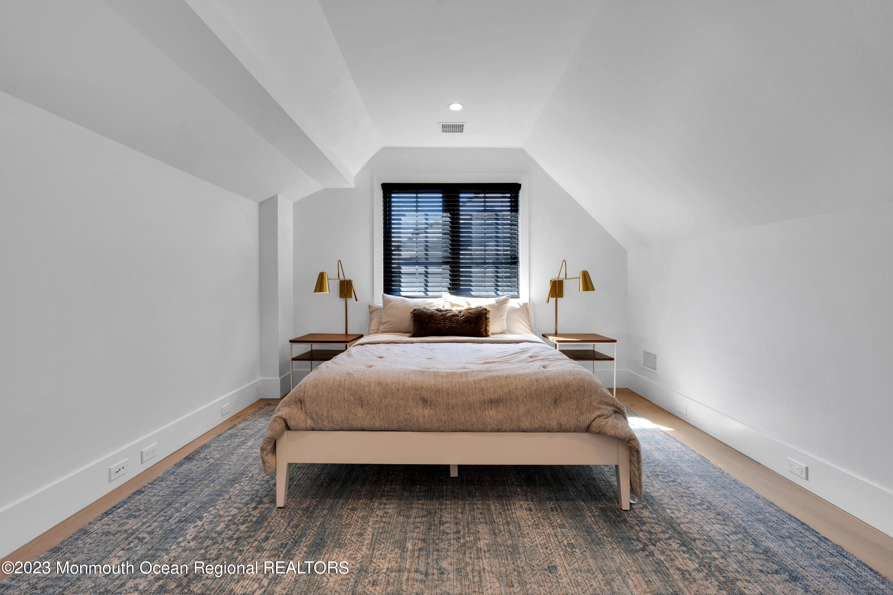 1125 North Ocean Avenue Mantoloking, NJ 08738 - Photo 47 of 69 a bedroom with a bed and a window