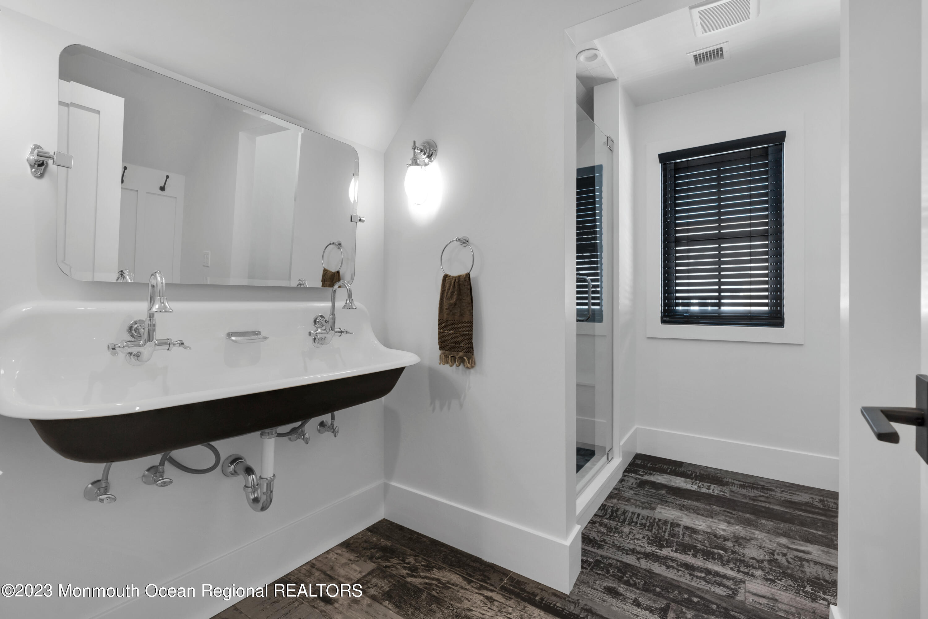 1125 North Ocean Avenue Mantoloking, NJ 08738 - Photo 48 of 69 a bathroom with a sink and a mirror