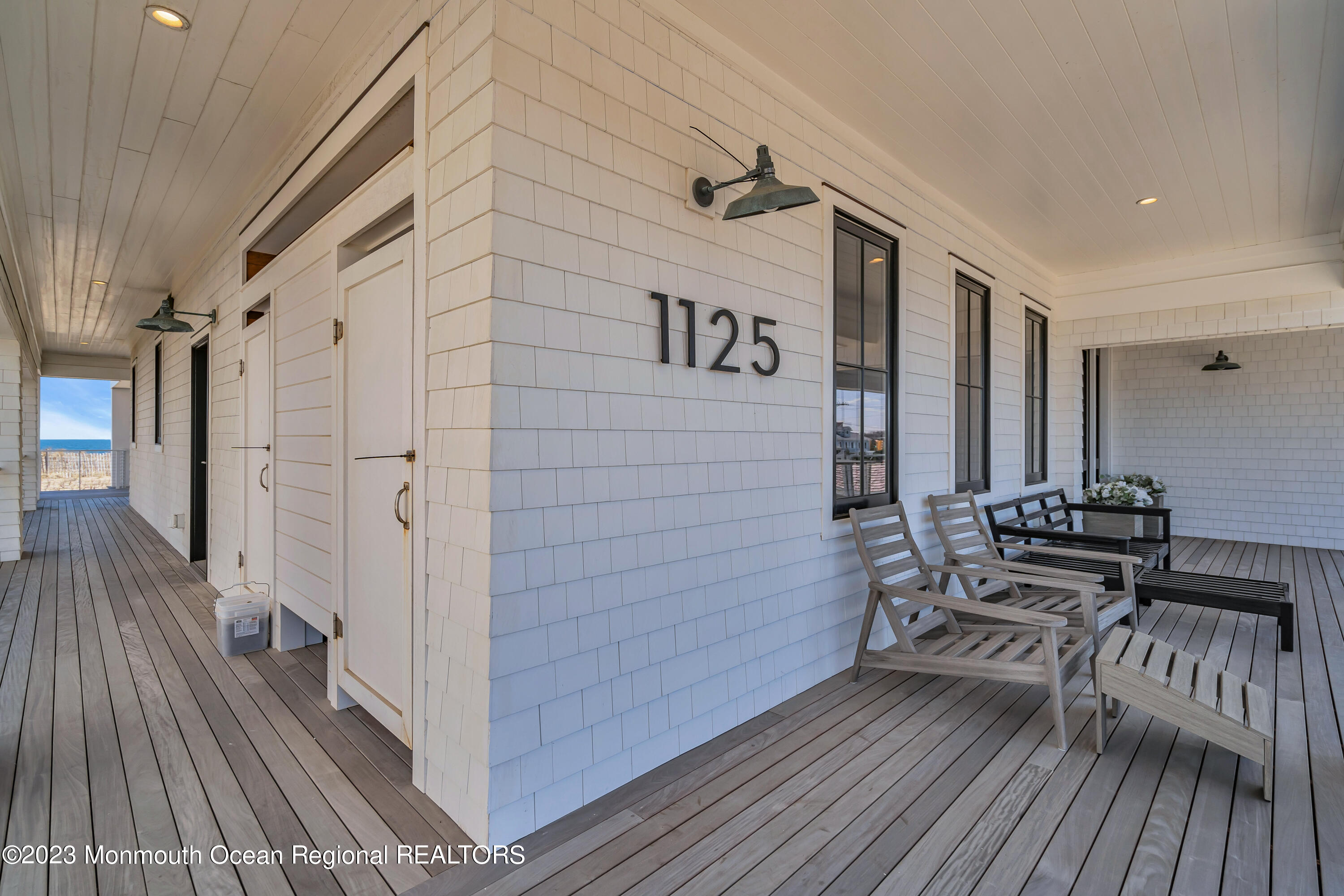1125 North Ocean Avenue Mantoloking, NJ 08738 - Photo 6 of 69 a view of a house with stairs and wooden floor