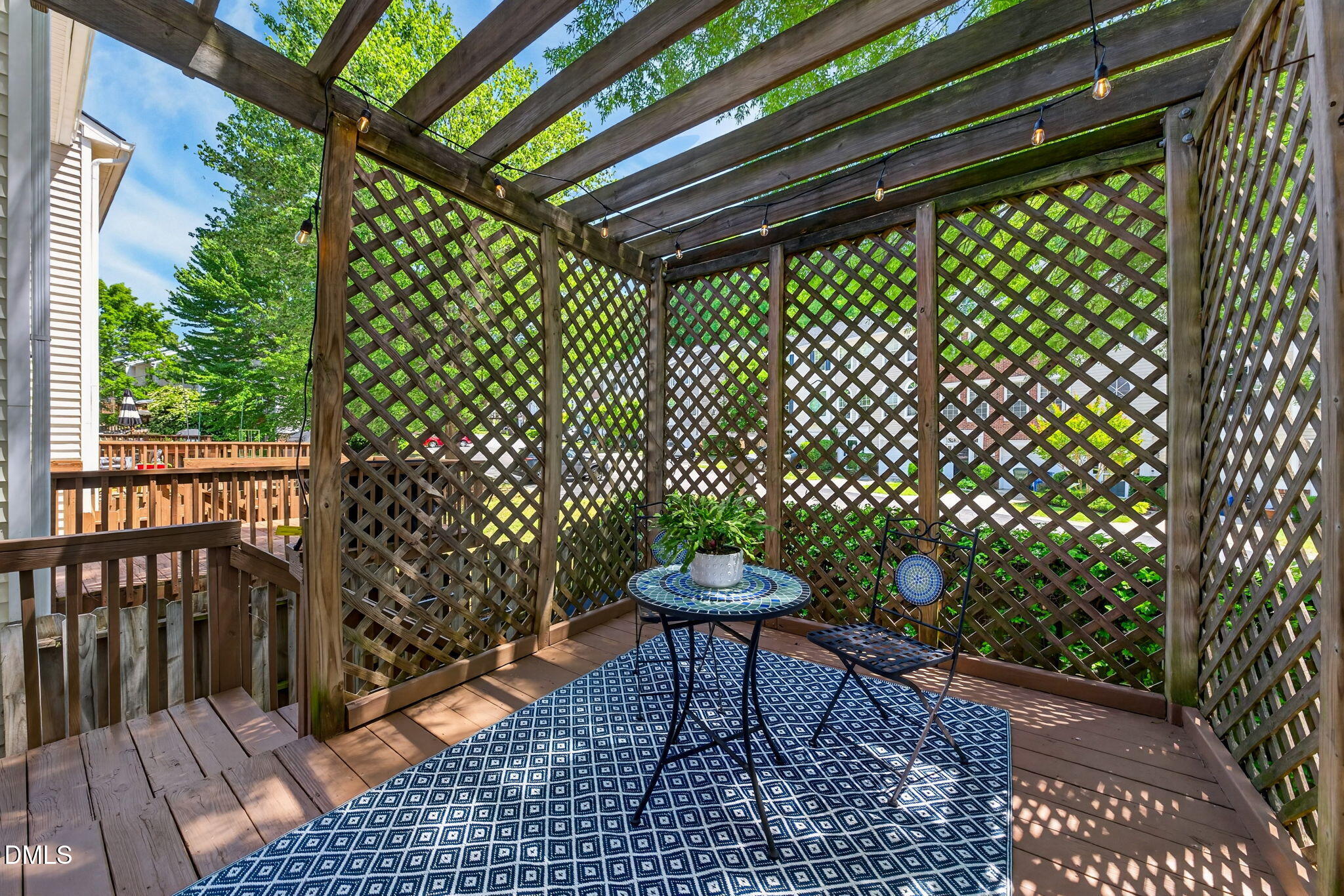 5500 Vista View Court Raleigh, NC 27612 - Photo 2 of 38 a chair and table in a backyard