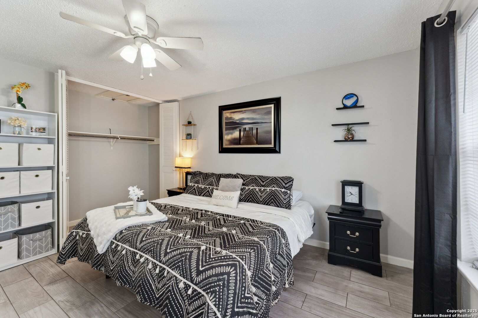 923 Vance Jackson Road, Unit 1104 San Antonio, TX 78201 - Photo 13 of 18 a bedroom with a bed and a view of bedroom