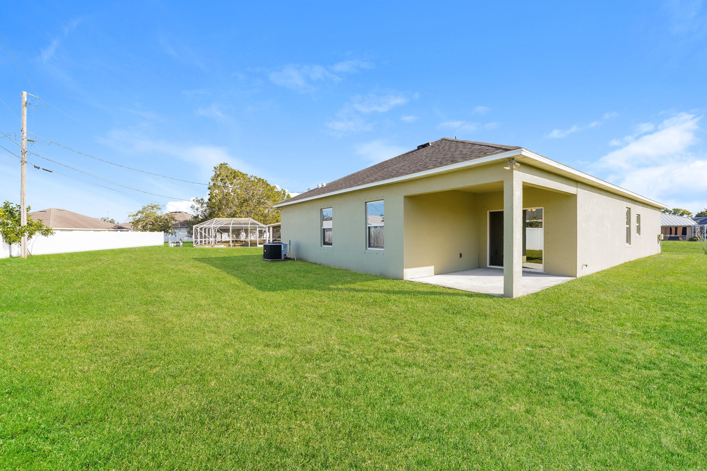 4334 Southwest Appleseed Road Port St. Lucie, FL 34953 - Photo 15 of 15 1000483.4334 SW Appleseed Road - Rear Vi