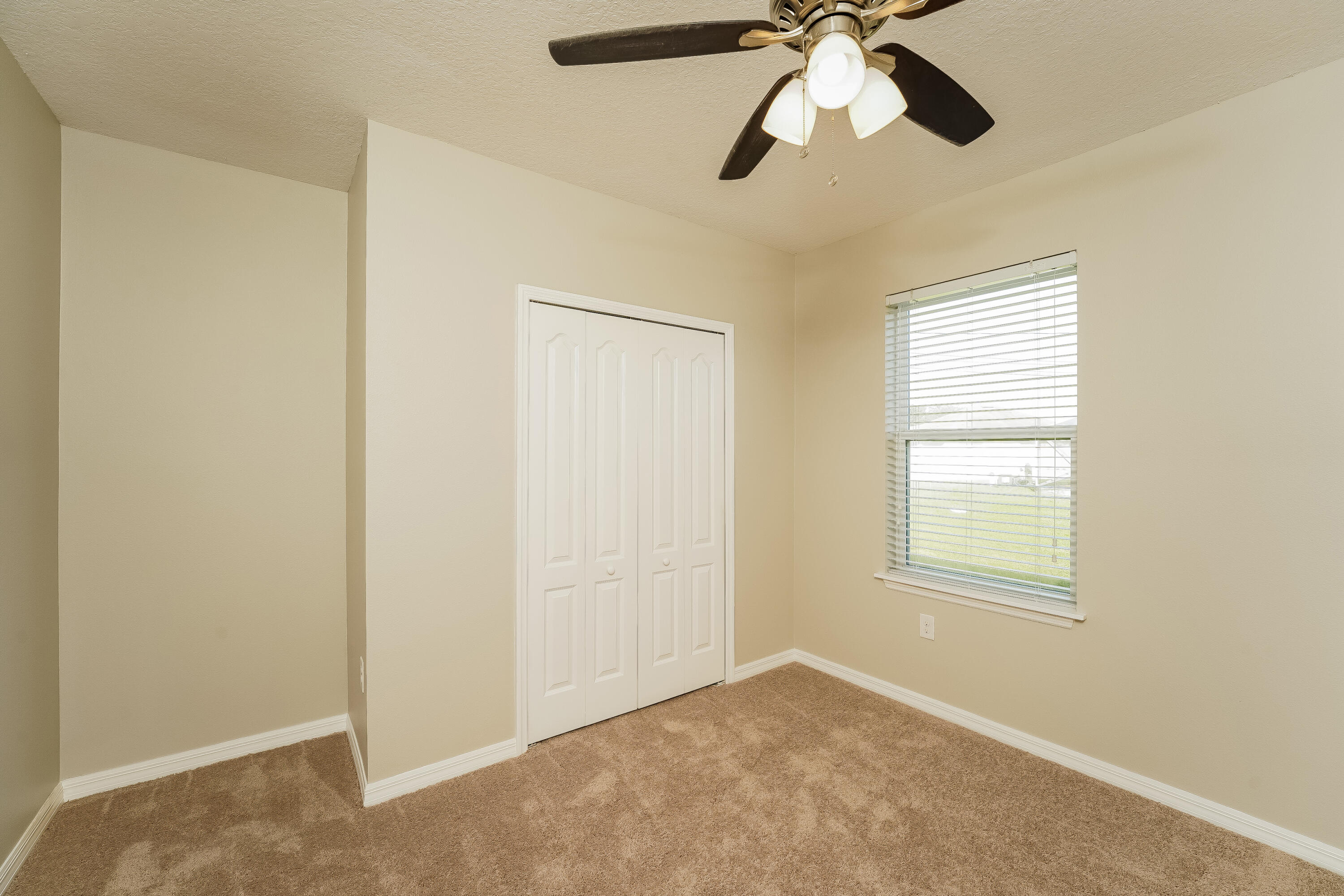 4334 Southwest Appleseed Road Port St. Lucie, FL 34953 - Photo 10 of 15 1000483.4334 SW Appleseed Road - Bedroom