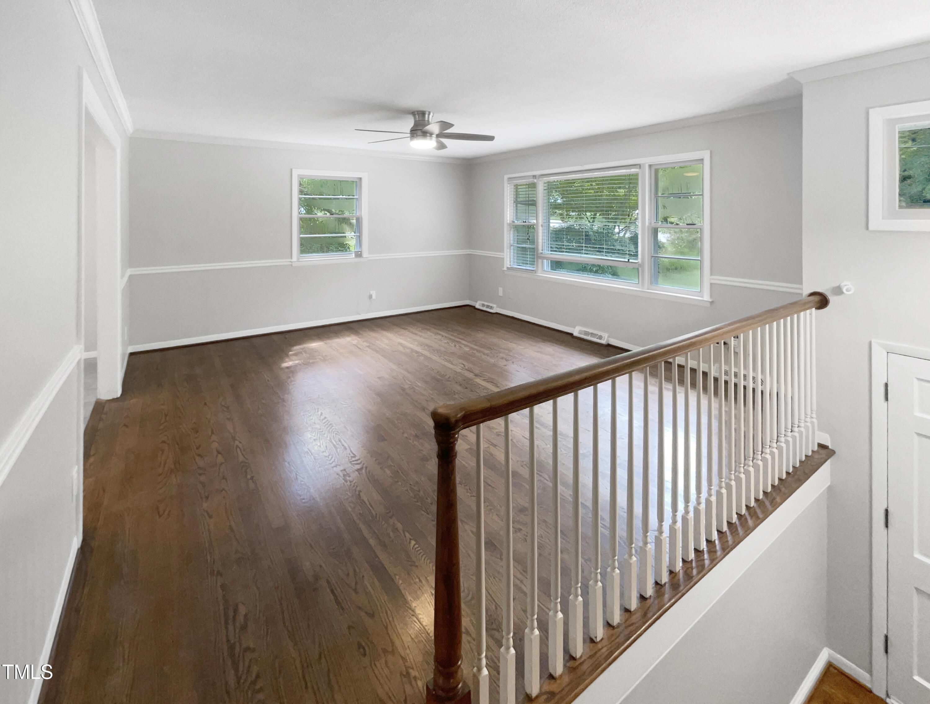 6310 Brandywine Road Raleigh, NC 27607 - Photo 16 of 22 wooden floor in an empty room with a window