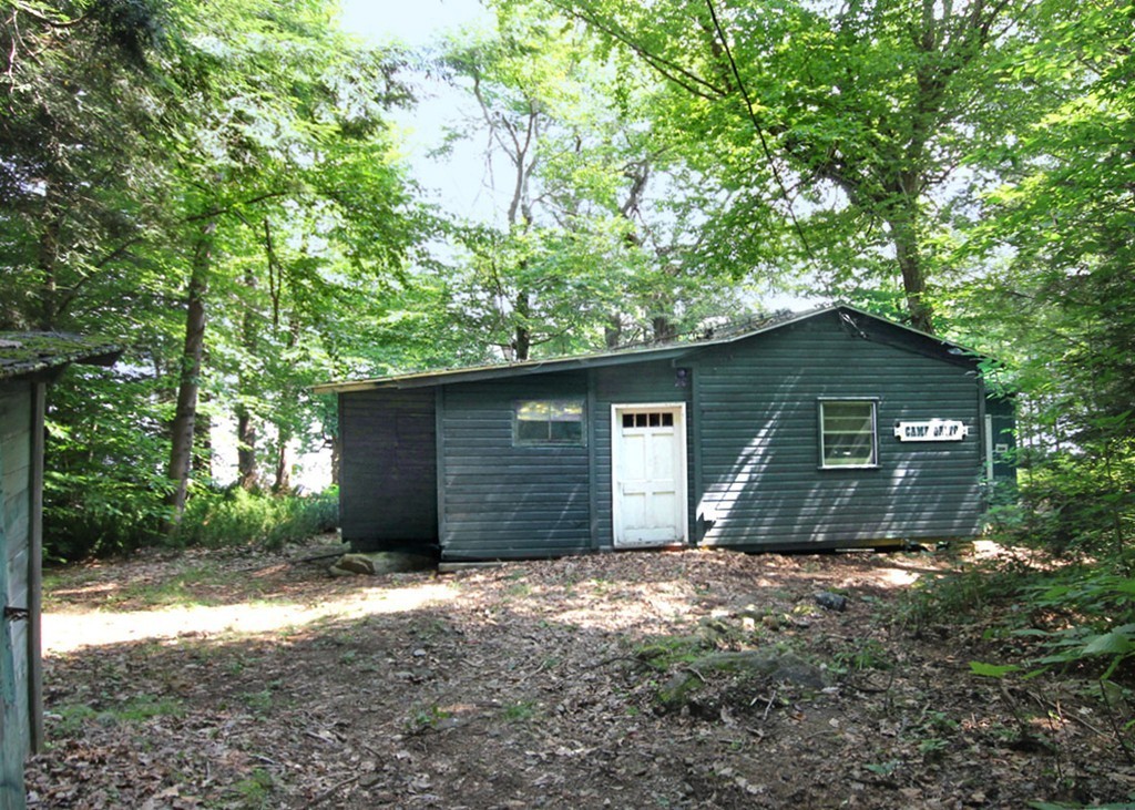 373 Stanley Road Otis, MA 01029 - Photo 3 of 14 a front view of house with yard