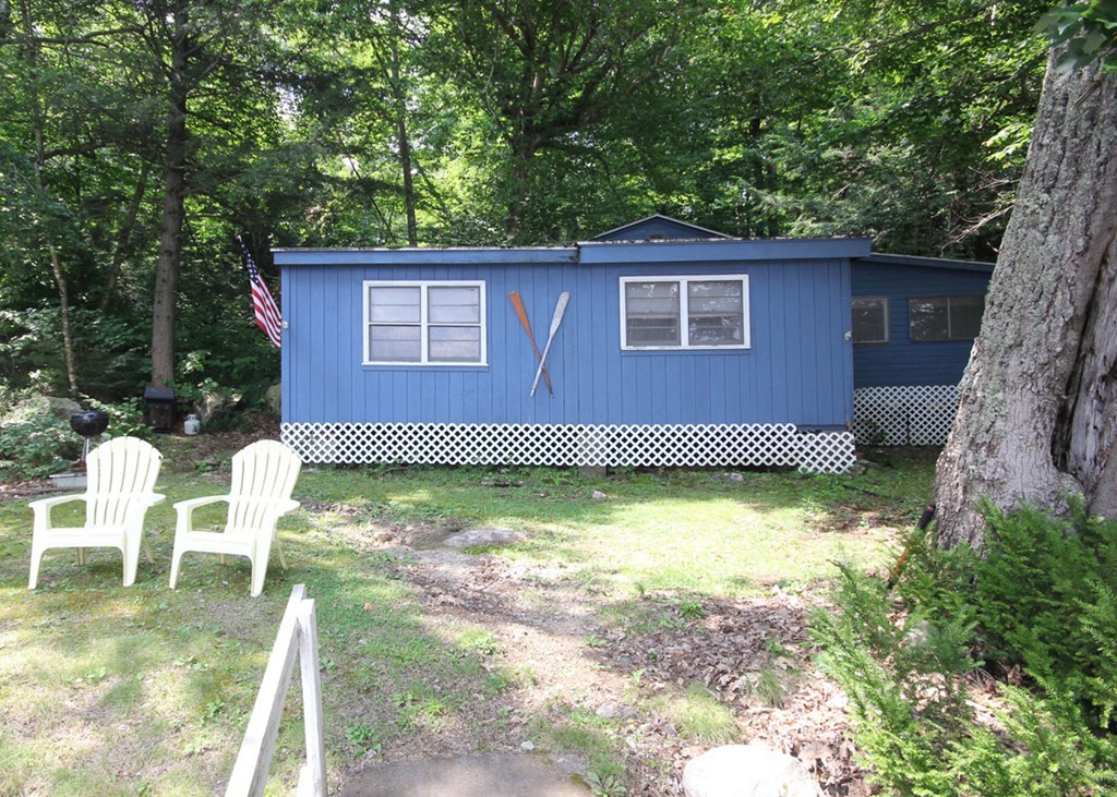 373 Stanley Road Otis, MA 01029 - Photo 4 of 14 a backyard of a house with lots of green space