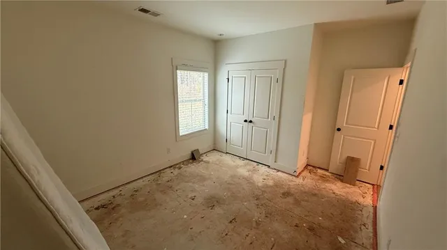 an empty room with windows