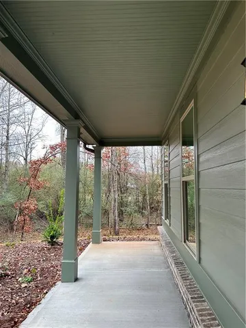 a view of backyard with green space