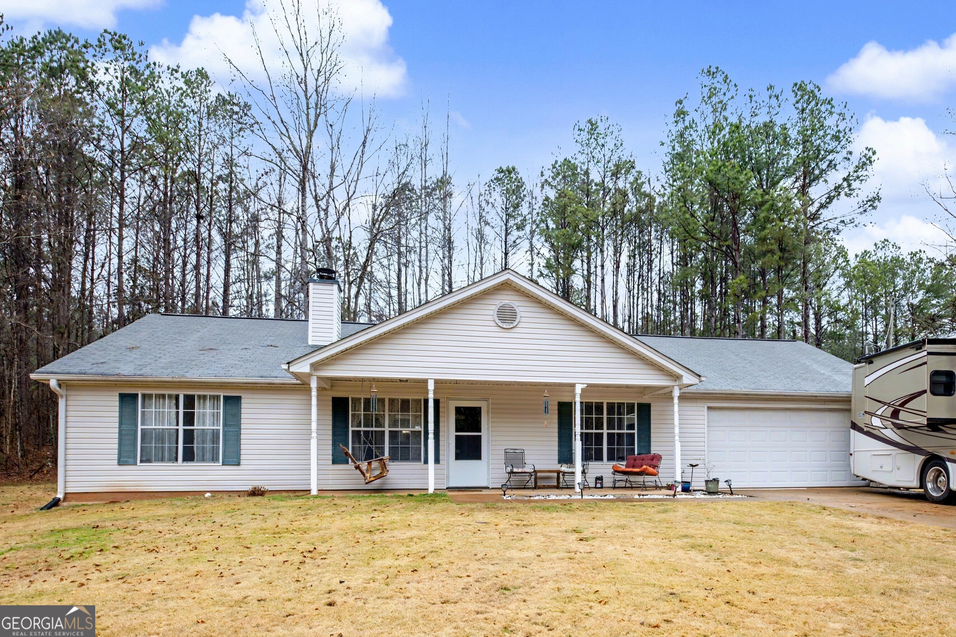 183 Buck Smith Road Hogansville, GA 30230 - Photo 1 of 28 a front view of a house with garden
