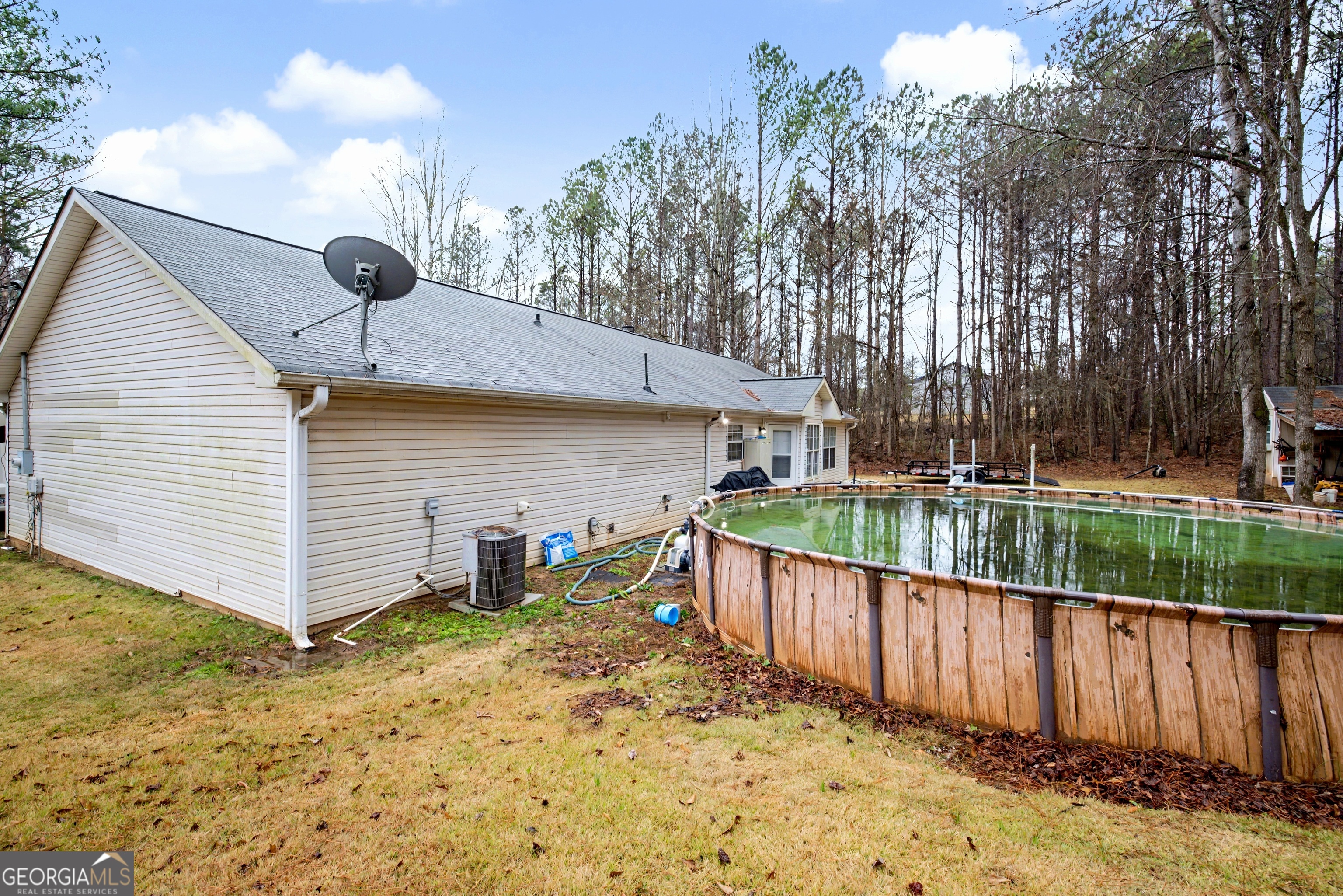 183 Buck Smith Road Hogansville, GA 30230 - Photo 25 of 28 a view of a backyard with wooden fence