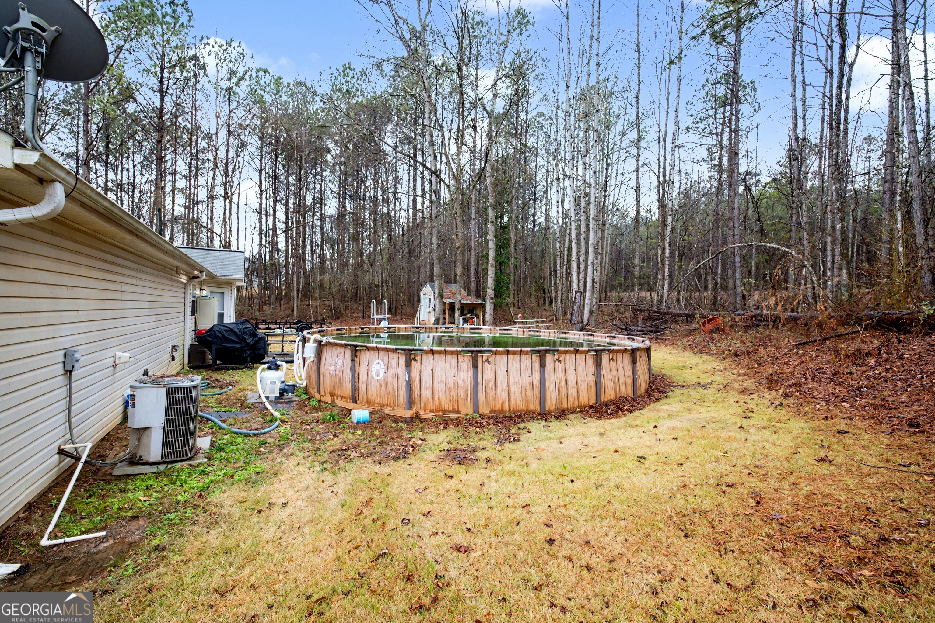 183 Buck Smith Road Hogansville, GA 30230 - Photo 27 of 28 a view of swimming pool with table and chairs