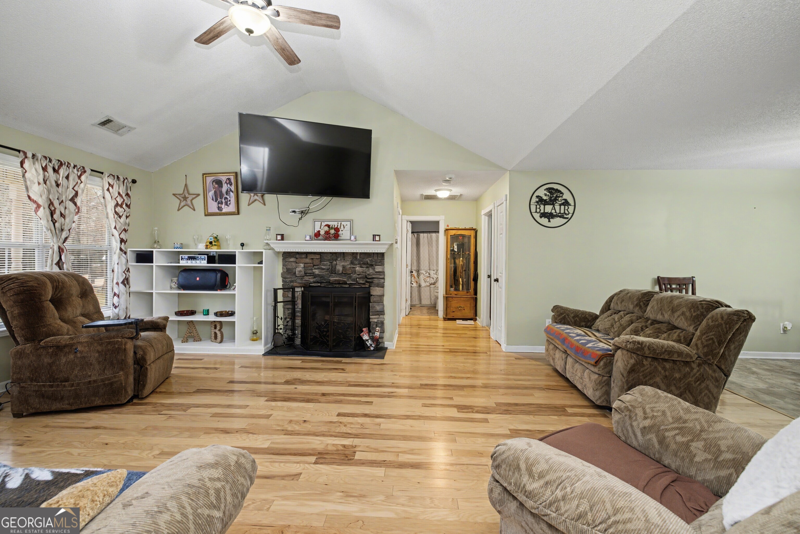 183 Buck Smith Road Hogansville, GA 30230 - Photo 7 of 28 a living room with furniture and a flat screen tv