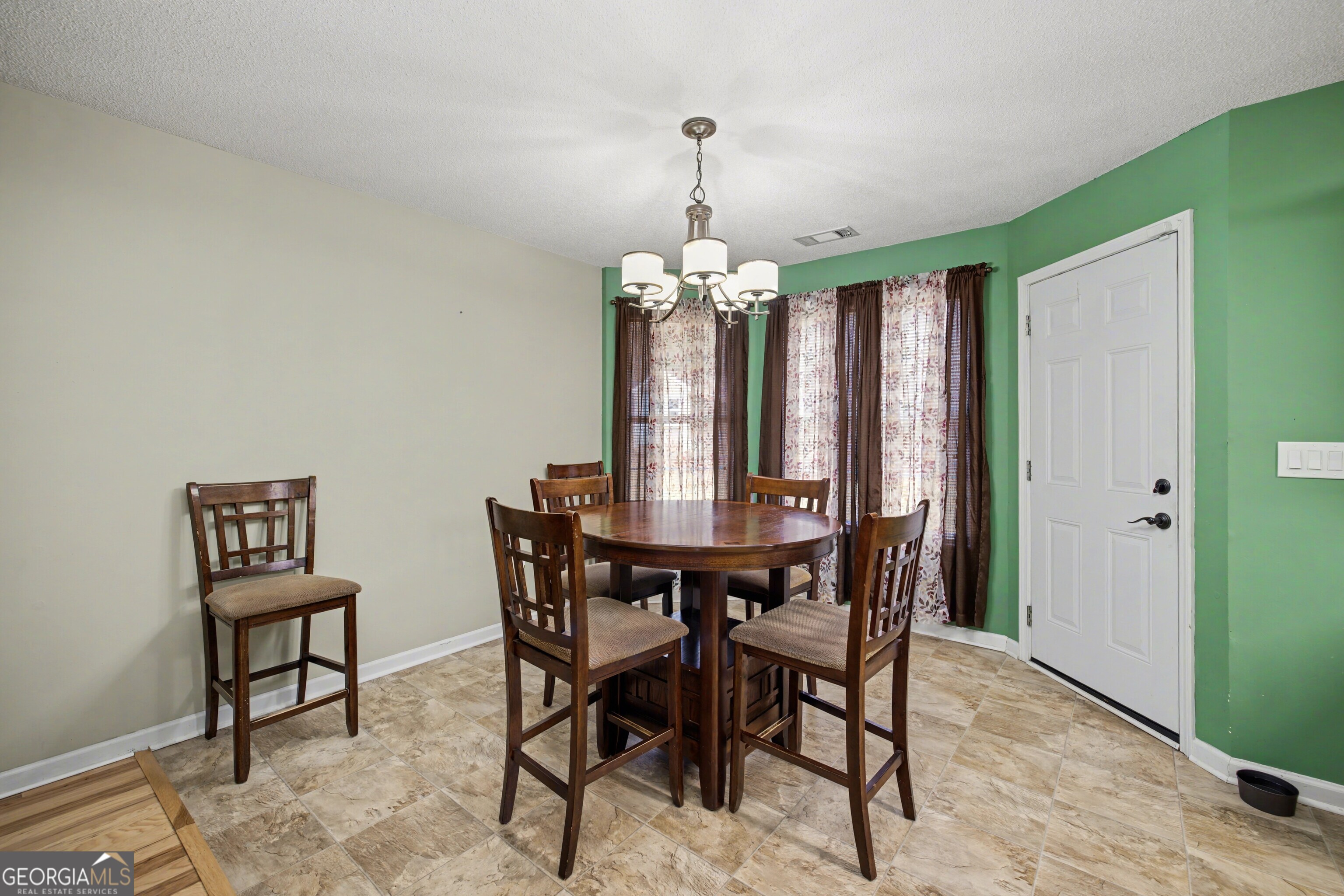 183 Buck Smith Road Hogansville, GA 30230 - Photo 9 of 28 a dining room with furniture and window