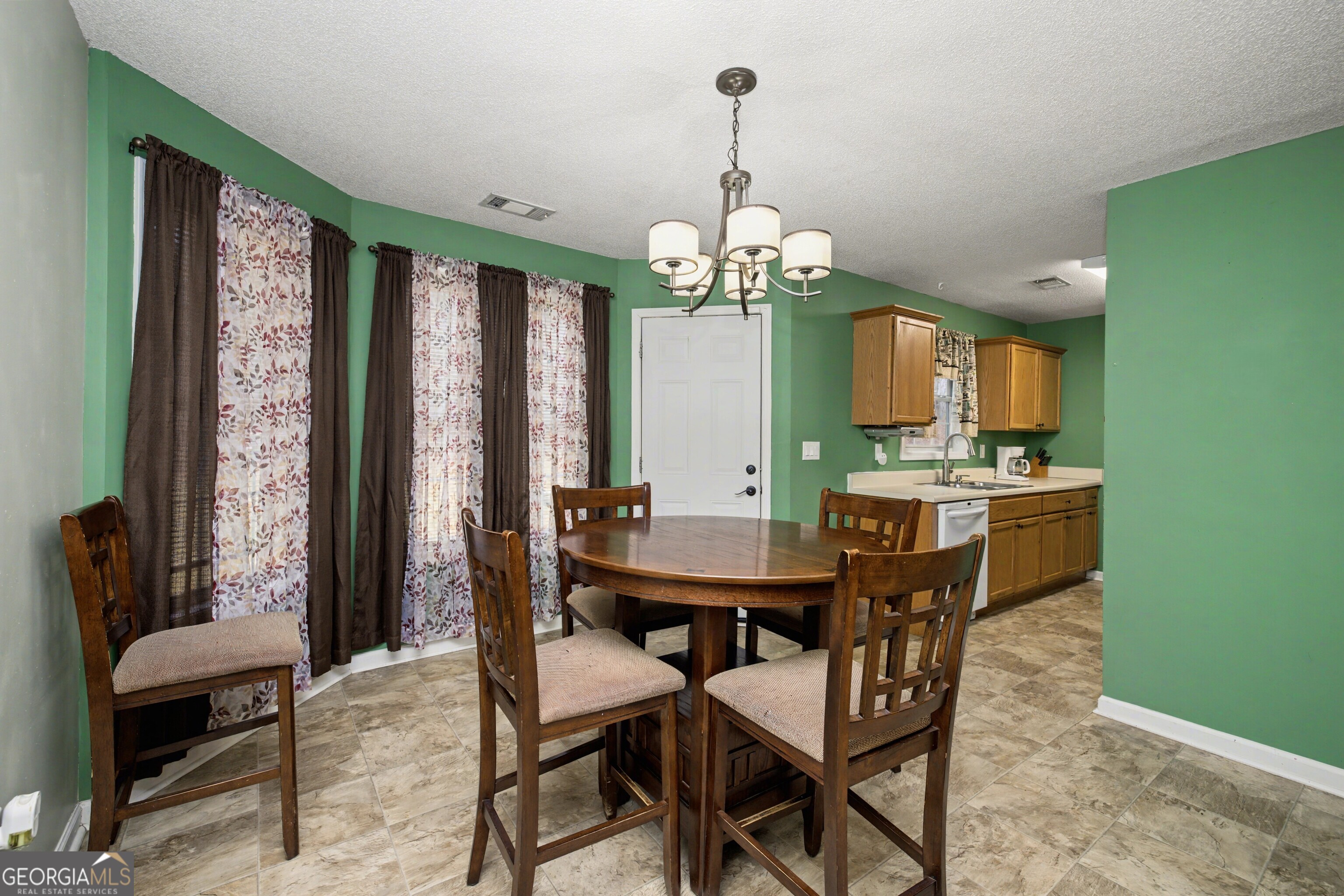 183 Buck Smith Road Hogansville, GA 30230 - Photo 10 of 28 a view of a dining room with furniture window and outside view