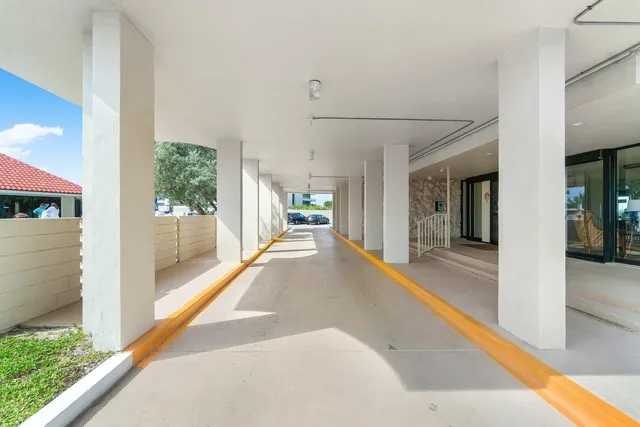 a view of lobby with furniture and large window