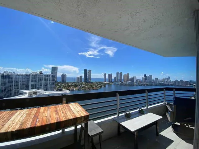 a view of a terrace with sitting area