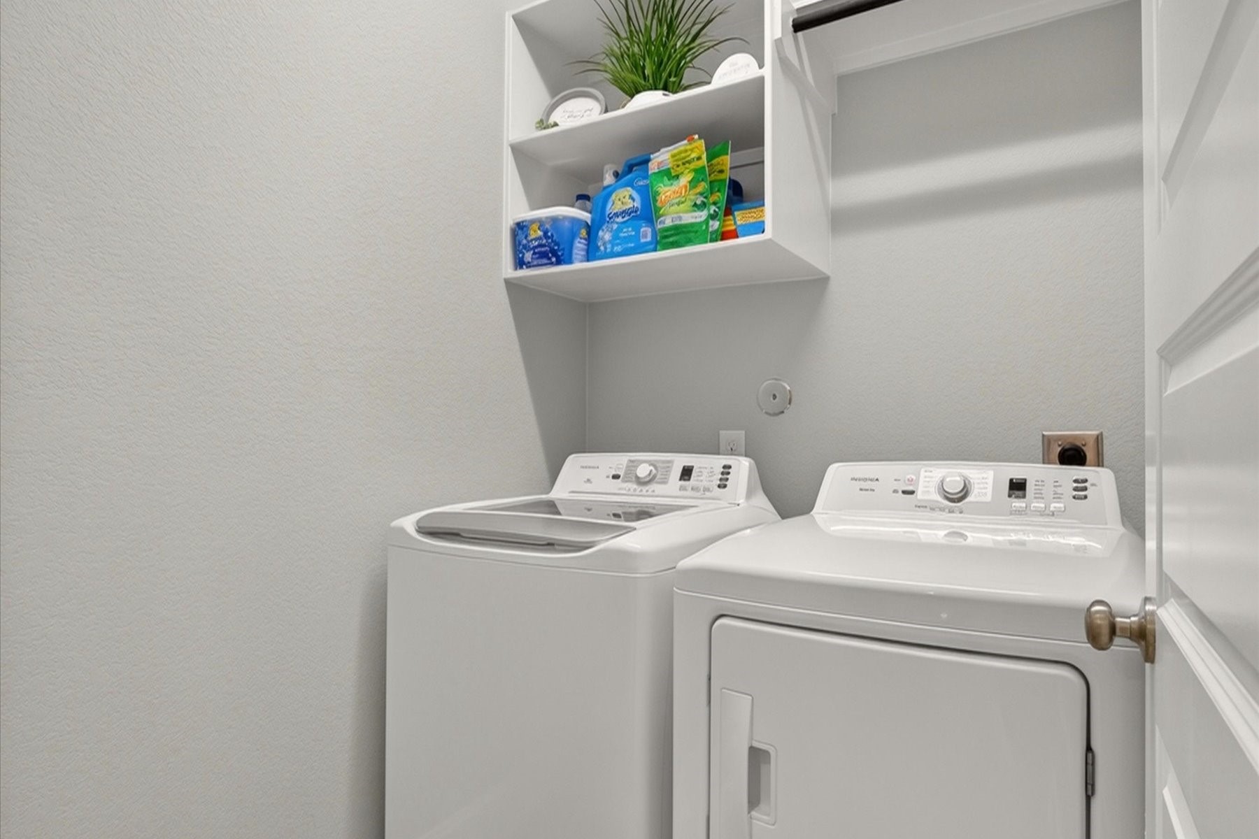 23026 Needle Grass Road Katy, TX 77493 - Photo 23 of 33 Convenient laundry room with built-in shelving.