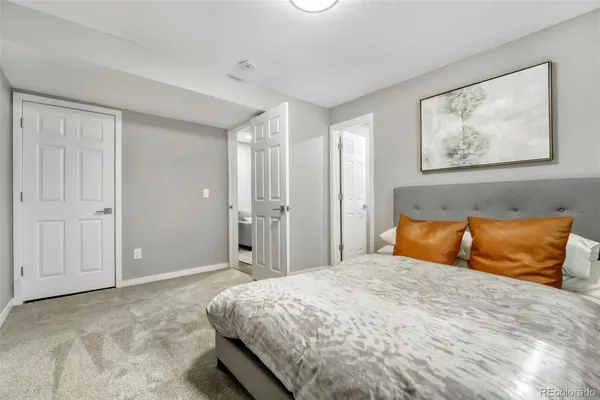 a bathroom with a shower and a toilet