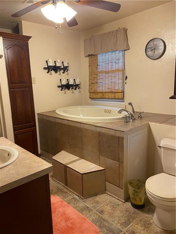 3545 Ellwood Road New Castle, PA 16101 - Photo 12 of 25 a bathroom with a sink toilet and mirror