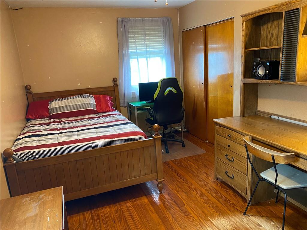 3545 Ellwood Road New Castle, PA 16101 - Photo 13 of 25 a bedroom with a bed and furniture