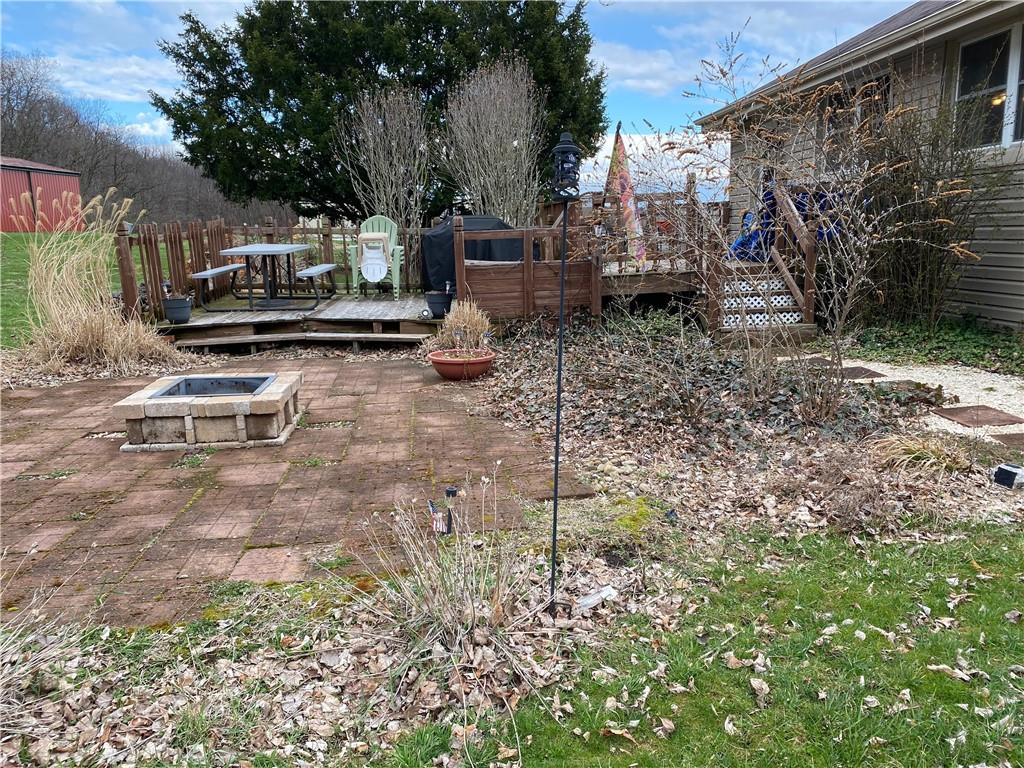 3545 Ellwood Road New Castle, PA 16101 - Photo 20 of 25 a view of a chairs and tables in the backyard