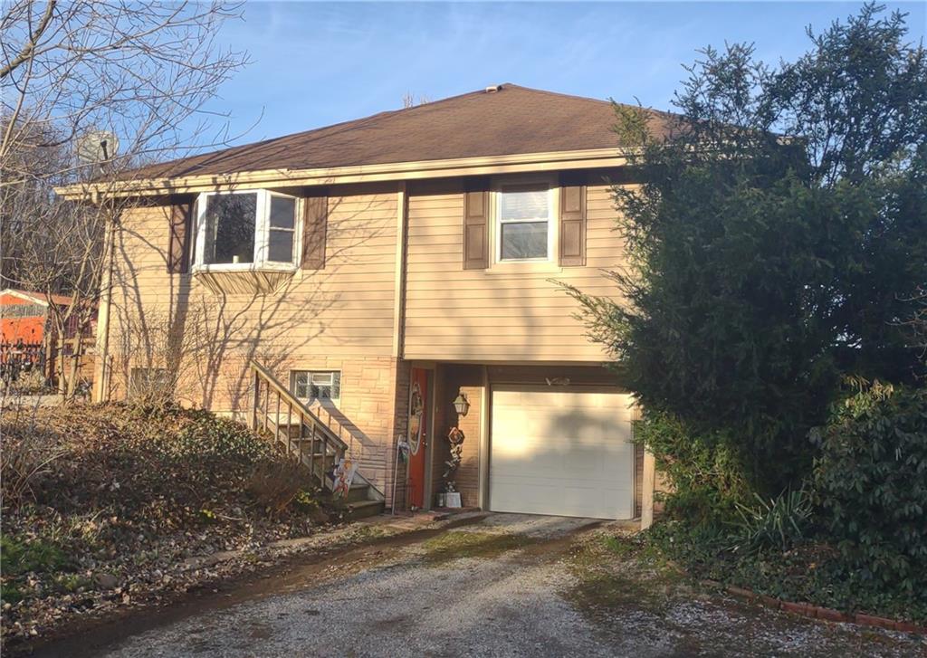 3545 Ellwood Road New Castle, PA 16101 - Photo 2 of 25 a front view of a house with a yard