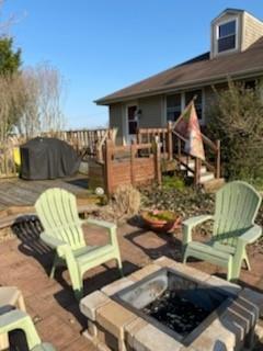 3545 Ellwood Road New Castle, PA 16101 - Photo 21 of 25 a view of a patio with couches table and chairs and potted plants