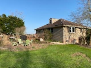 3545 Ellwood Road New Castle, PA 16101 - Photo 25 of 25 a backyard of a house with table and chairs