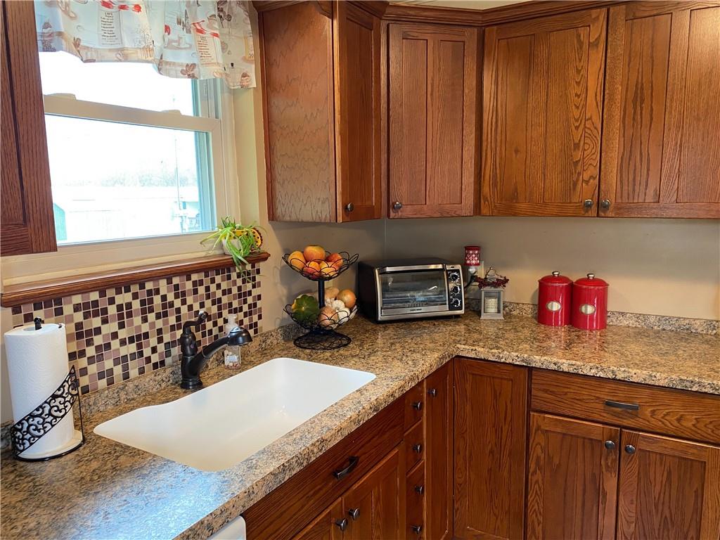 3545 Ellwood Road New Castle, PA 16101 - Photo 7 of 25 a kitchen with a sink and cabinets