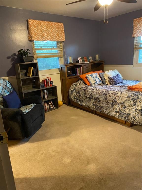 3545 Ellwood Road New Castle, PA 16101 - Photo 10 of 25 a bedroom with a bed and a television