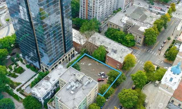 an aerial view of multiple house with yard